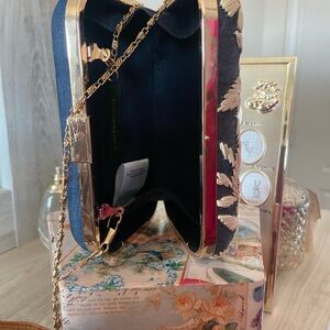 Anthropologie Navy and Gold Clutch